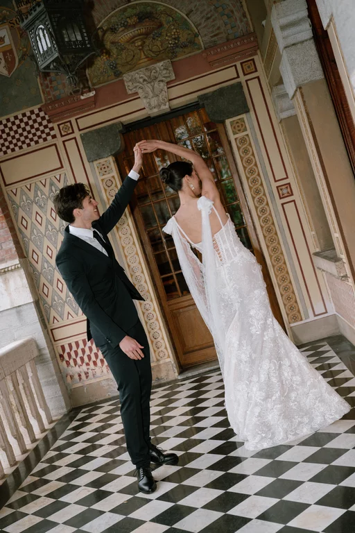 Luxury destination wedding photography of an dancing couple at an Italian villa
