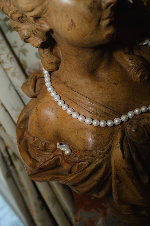 Elegant wedding pearls styling photographed at a European destination wedding